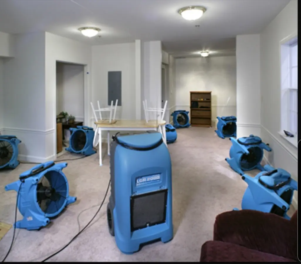 Air movers and dehumidifier setup for Water Damage Restoration in Pflugerville